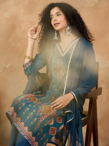 varanga Women A Vibrant 3-Piece Blue Ikat-Printed Kurta Set With Solid Trousers And A Lace-Trimmed Dupatta (Perfect For Festive Occasions, Styled Best With Jhumkas, Juttis, And Soft Glam Makeup.)
